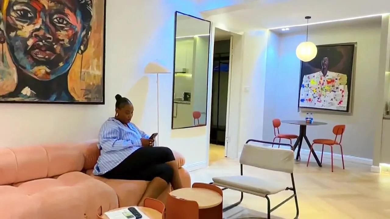 A guest relaxing in a Cherry Shortlets apartment
